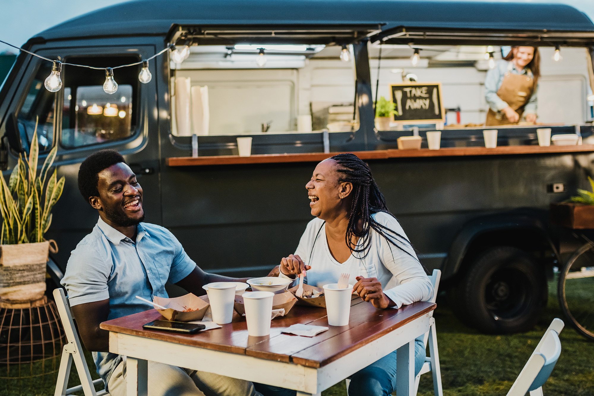 Couple eating outside