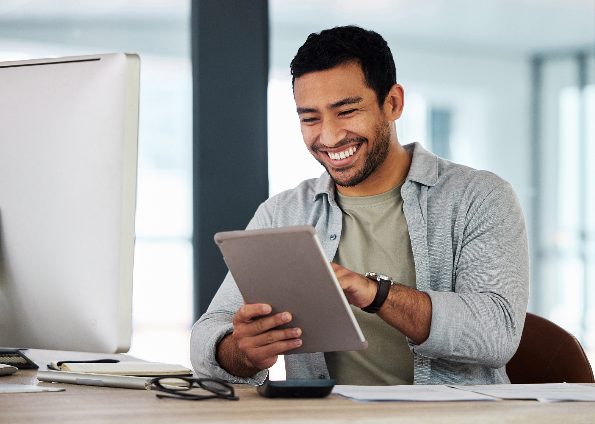 Man using smart device tablet