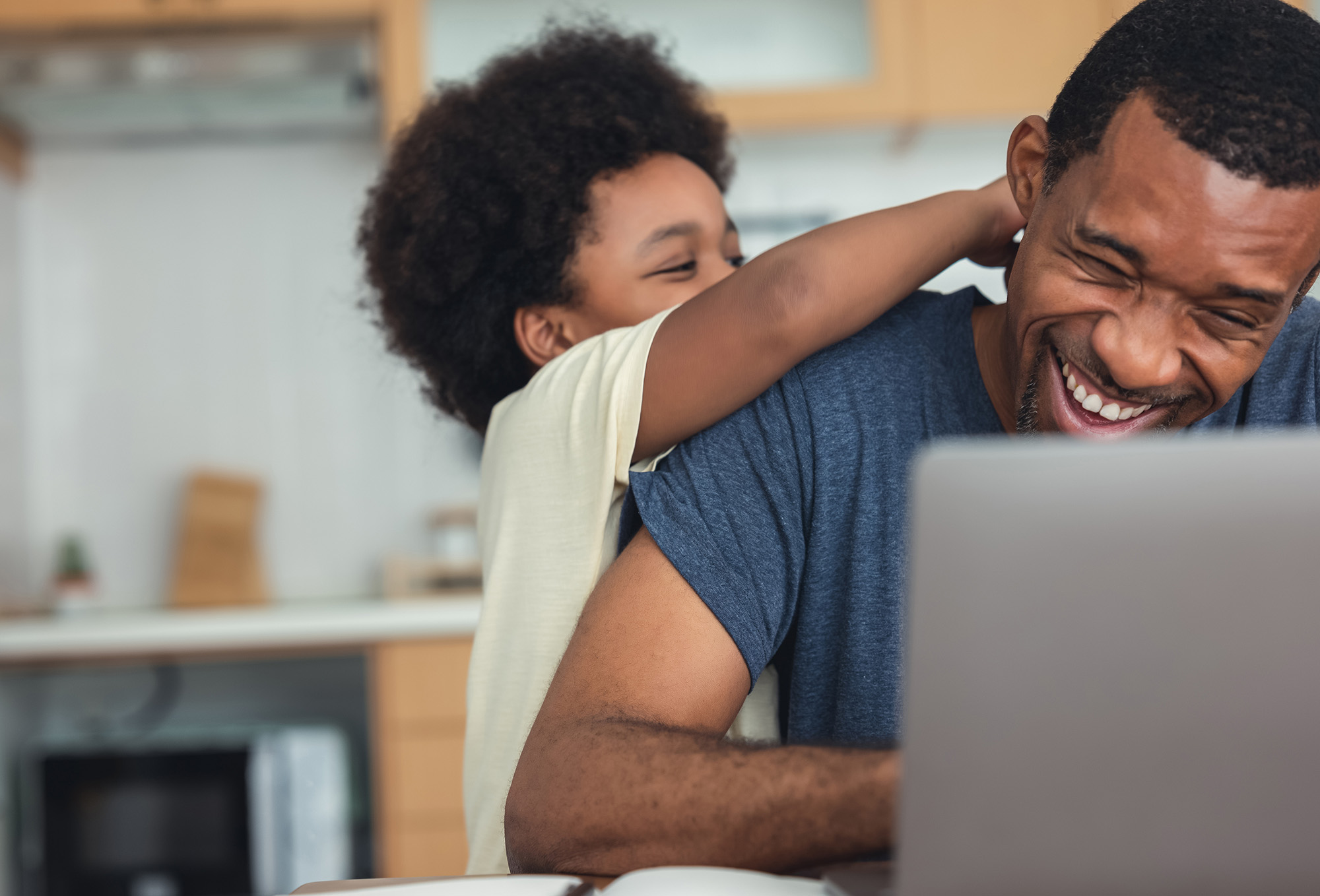 Child and father inside playing